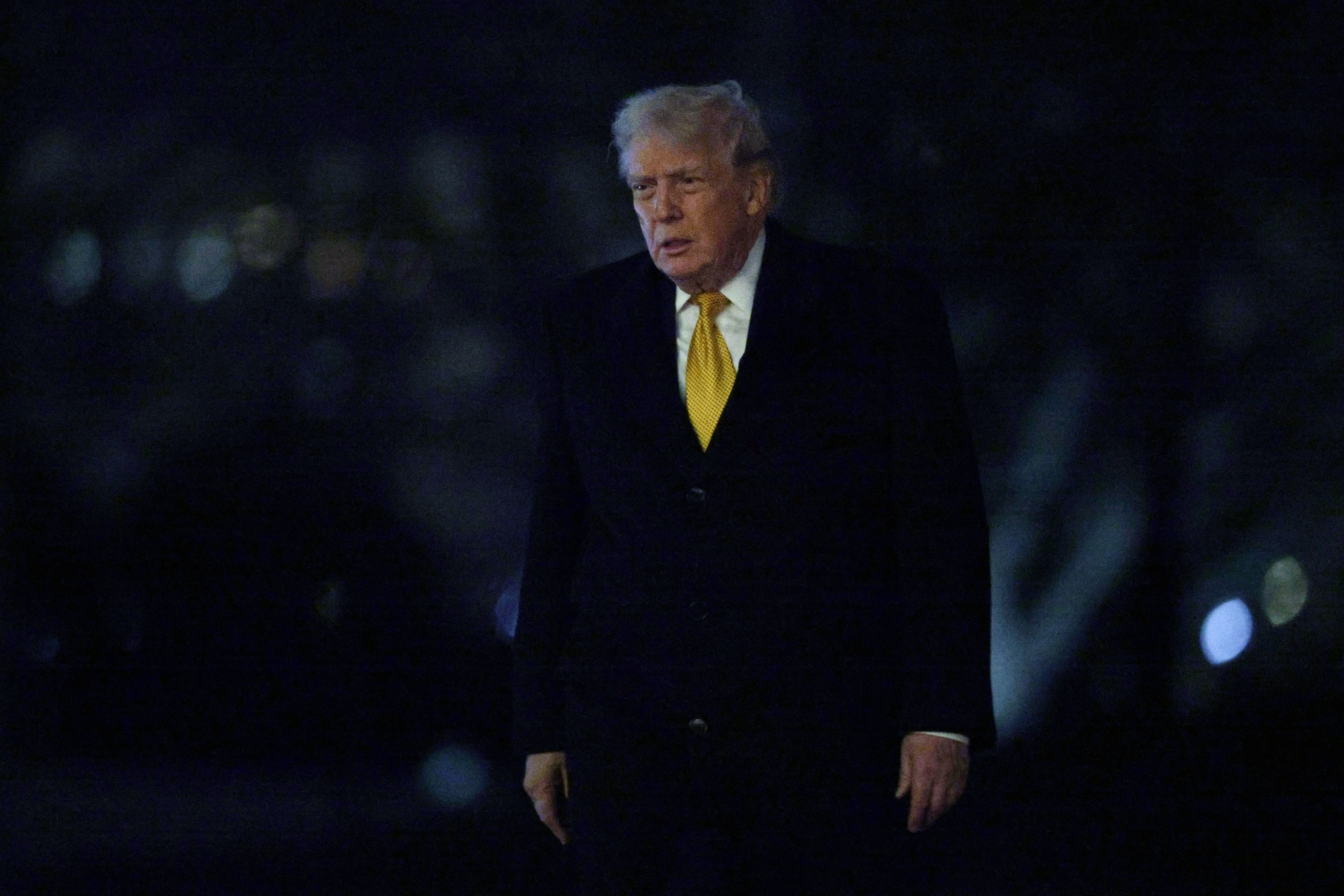 WASHINGTON, DC - JANUARY 04: U.S. President Donald Trump walks on the South Lawn after landing at the White House on January 4, 2026, in Washington, D.C. President Trump returned to Washington from his winter break at the Mar-a-Lago Club in Palm Beach, Florida, one day after U.S. forces captured former Venezuelan President Nicolas Maduro and his wife in a raid on his compound in the capital city of Caracas. (Photo by Alex Wong/Getty Images)