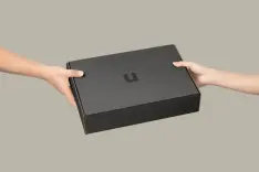 A black box with the letter U on it.