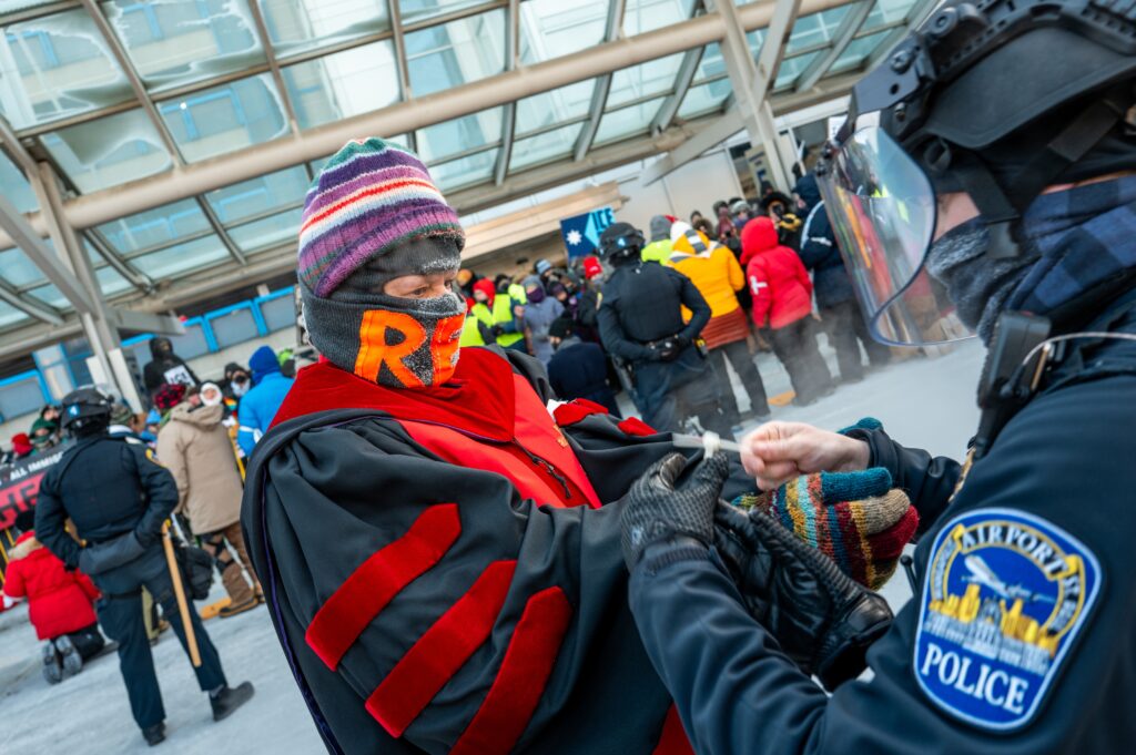 100 clergy arrested at airport protest as Minnesotans strike against ICE