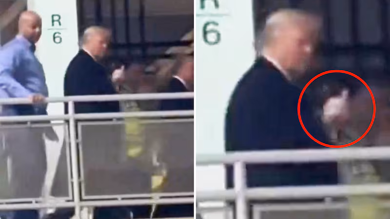 Donald Trump gives middle finger to worker at Ford Plant.