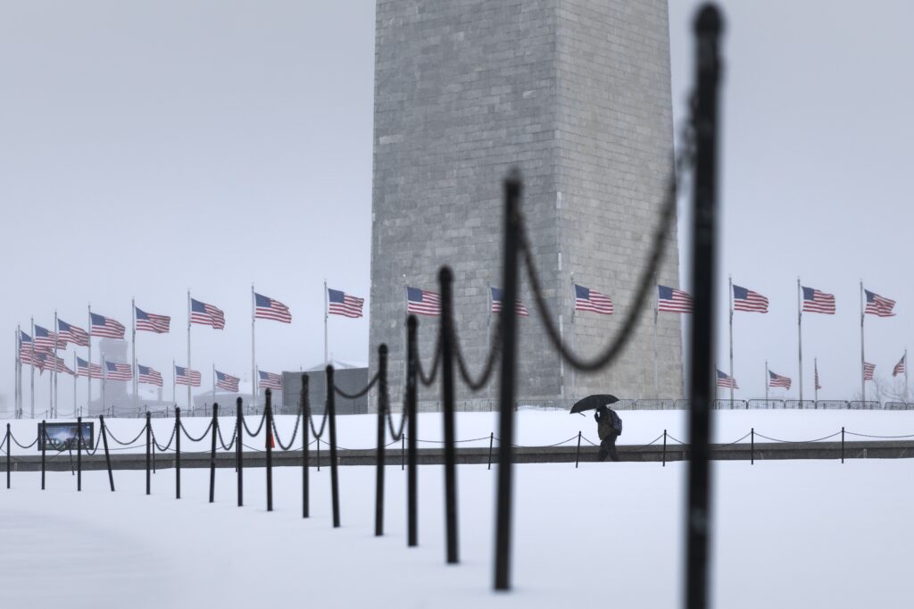 Frozen D.C. region sees messy roads, closed schools and a weather-related death