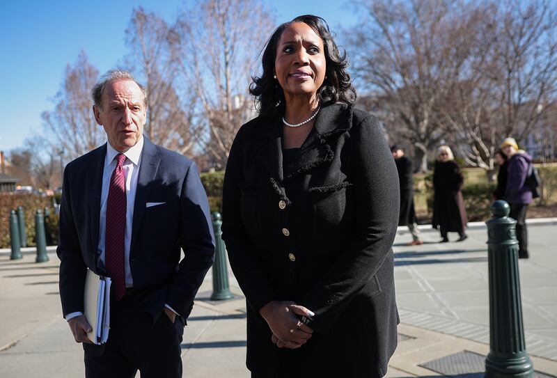 Federal Reserve Governor Lisa Cook and attorney Abbe Lowell outside the Supreme Court on January 21, 2026 where the court heard oral arguments in Trump v. Cook.