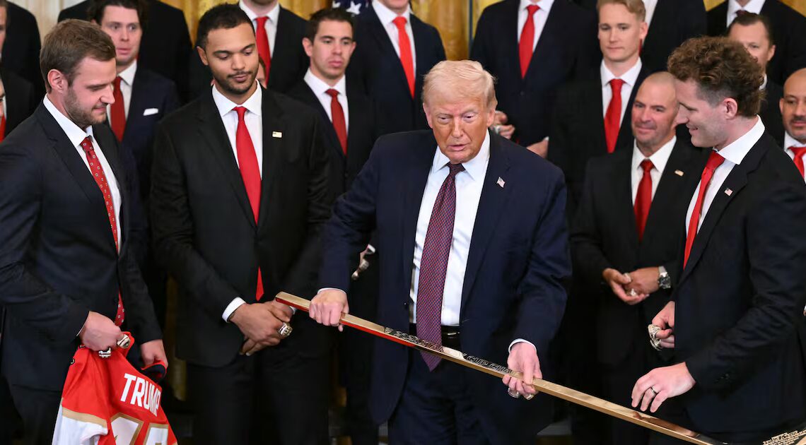 Trump Accepts Golden Hockey Stick Adding to Tacky Collection