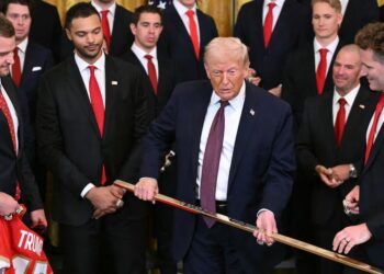 Trump Accepts Golden Hockey Stick Adding to Tacky Collection