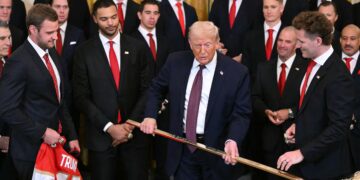 Trump Accepts Golden Hockey Stick Adding to Tacky Collection