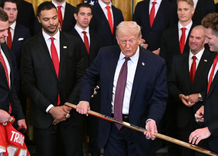 Trump Accepts Golden Hockey Stick Adding to Tacky Collection