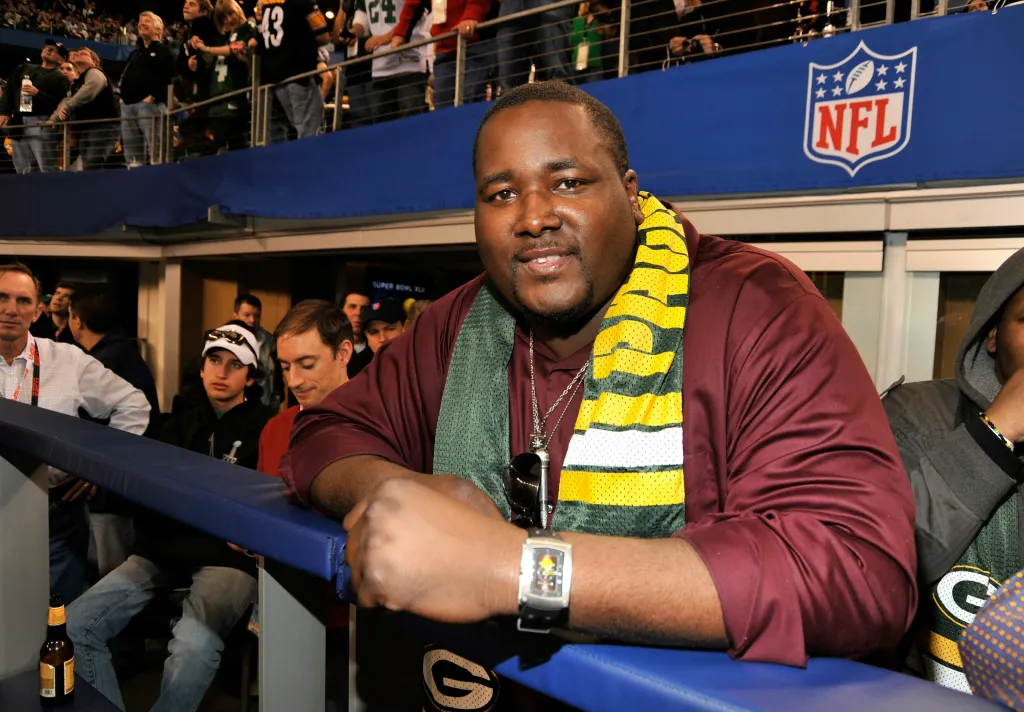 Quinton Aaron attends the Bridgestone Super Bowl XLV Pregame Show at Dallas Cowboys Stadium on February 6, 2011 in Arlington, Texas.