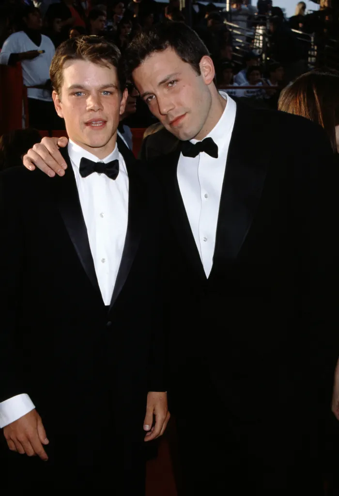 Actors Matt Damon and Ben Affleck pose for a photo at the 71st Annual Academy Awards.