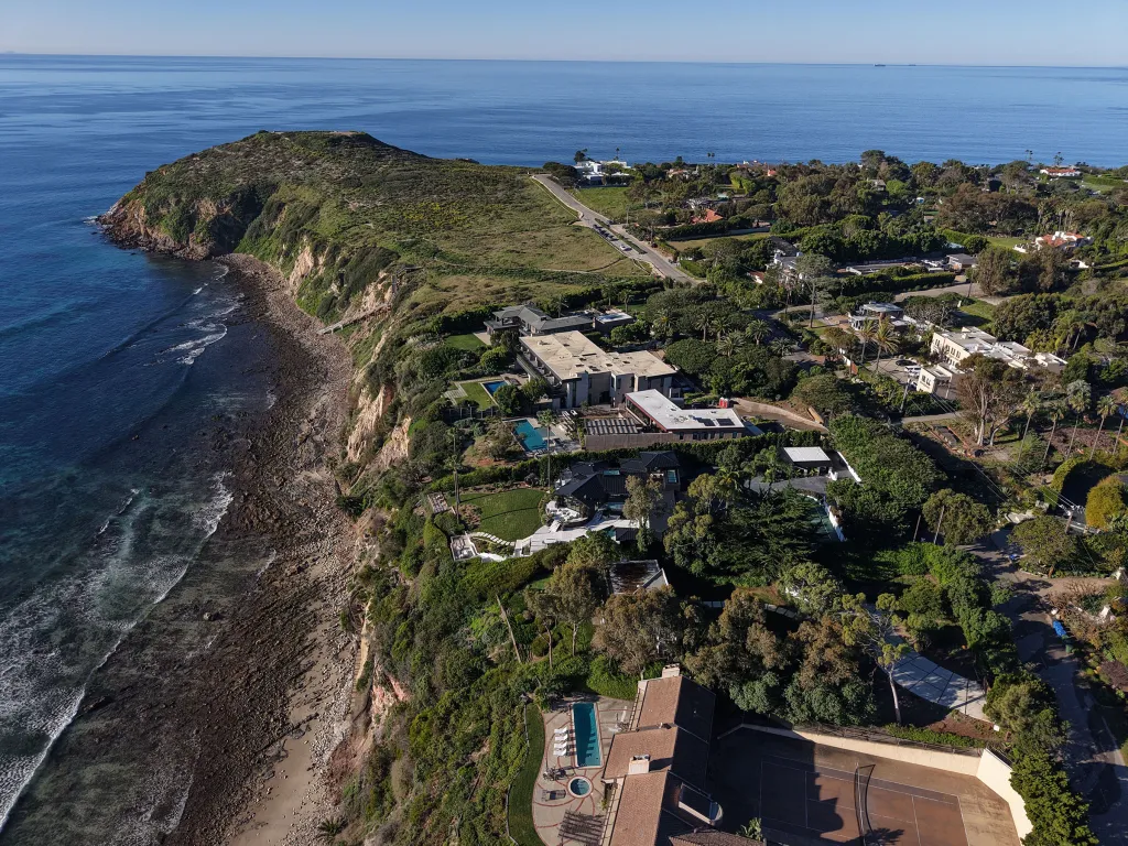 Aerial view of Sergey Brin's clifftop property in Malibu, California, with the Pacific Ocean in the background.