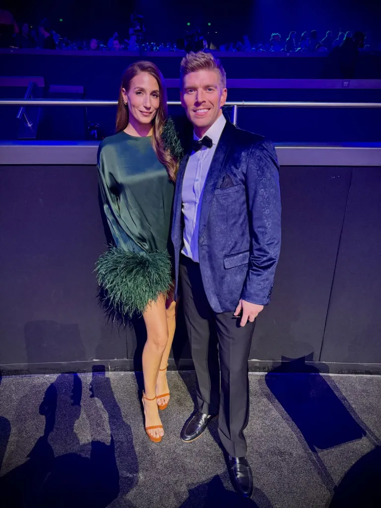 Amanda Batula and Kyle Cooke posing together.