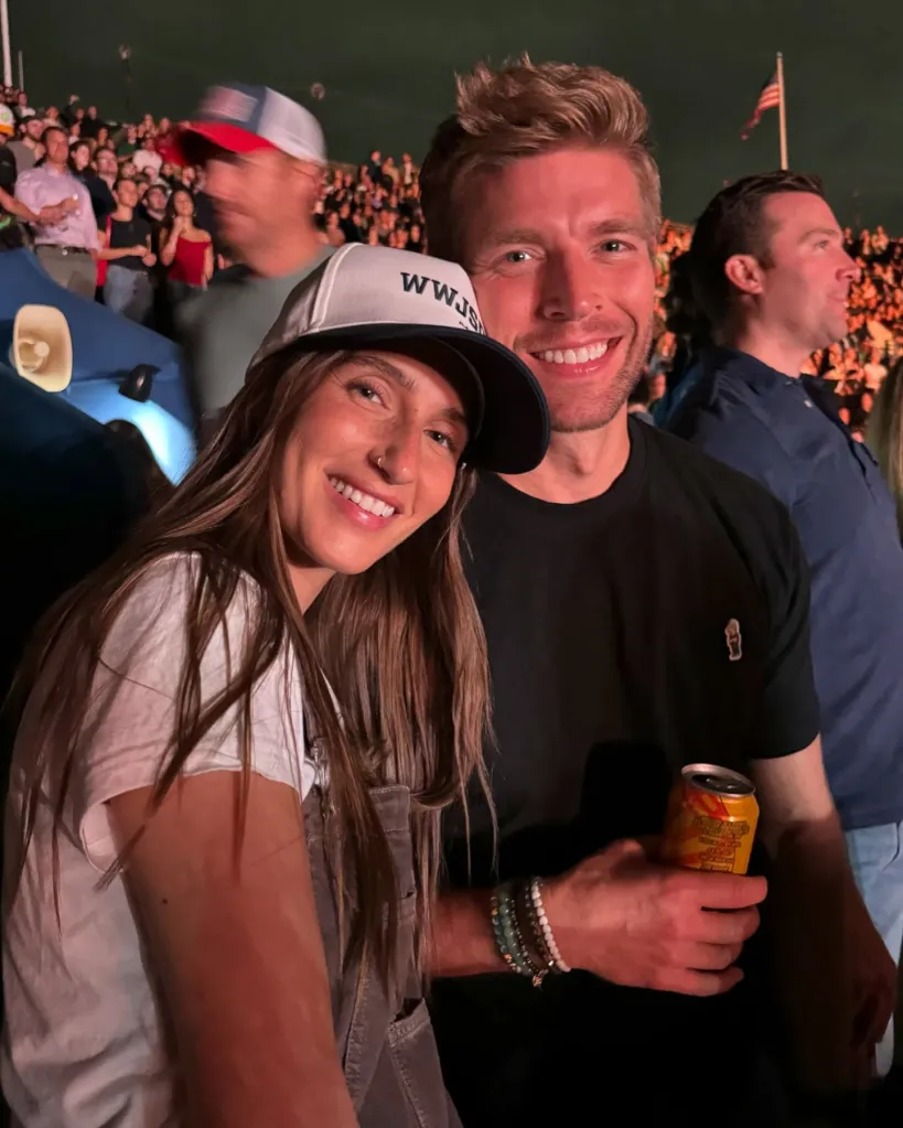 Amanda Batula and Kyle Cooke at an outdoor event.