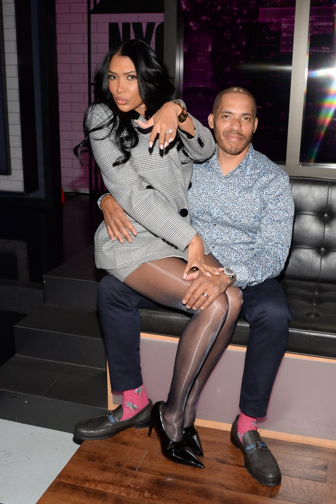 Brit Eady and her husband Michael Cunningham pose after her appearance on 