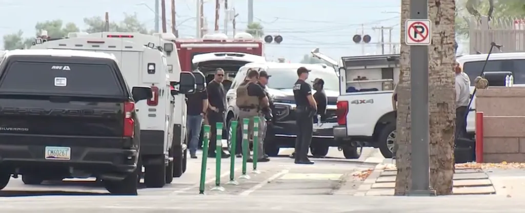 Emergency vehicles and first responders at the Arizona Supreme Court building after a suspicious package was found.