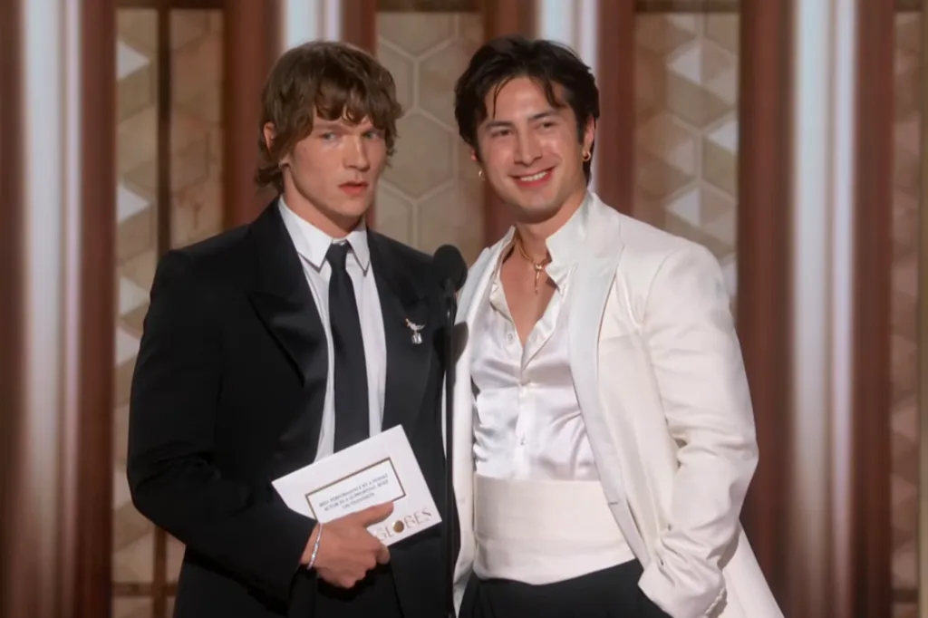 Connor Storrie and Hudson Williams at the 83rd Annual Golden Globe Awards.