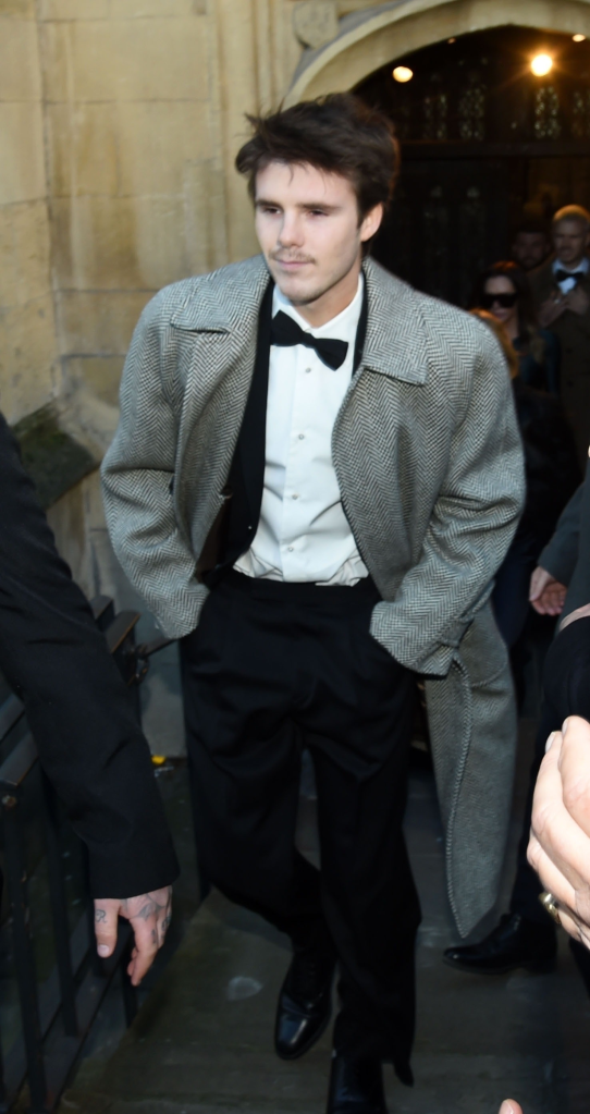 Cruz Beckham leaving Bath Abbey after Holly Ramsay's wedding.