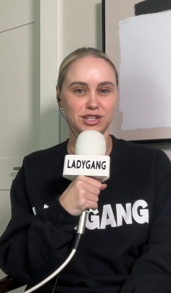 Becca Tobin speaking into a LadyGang microphone.
