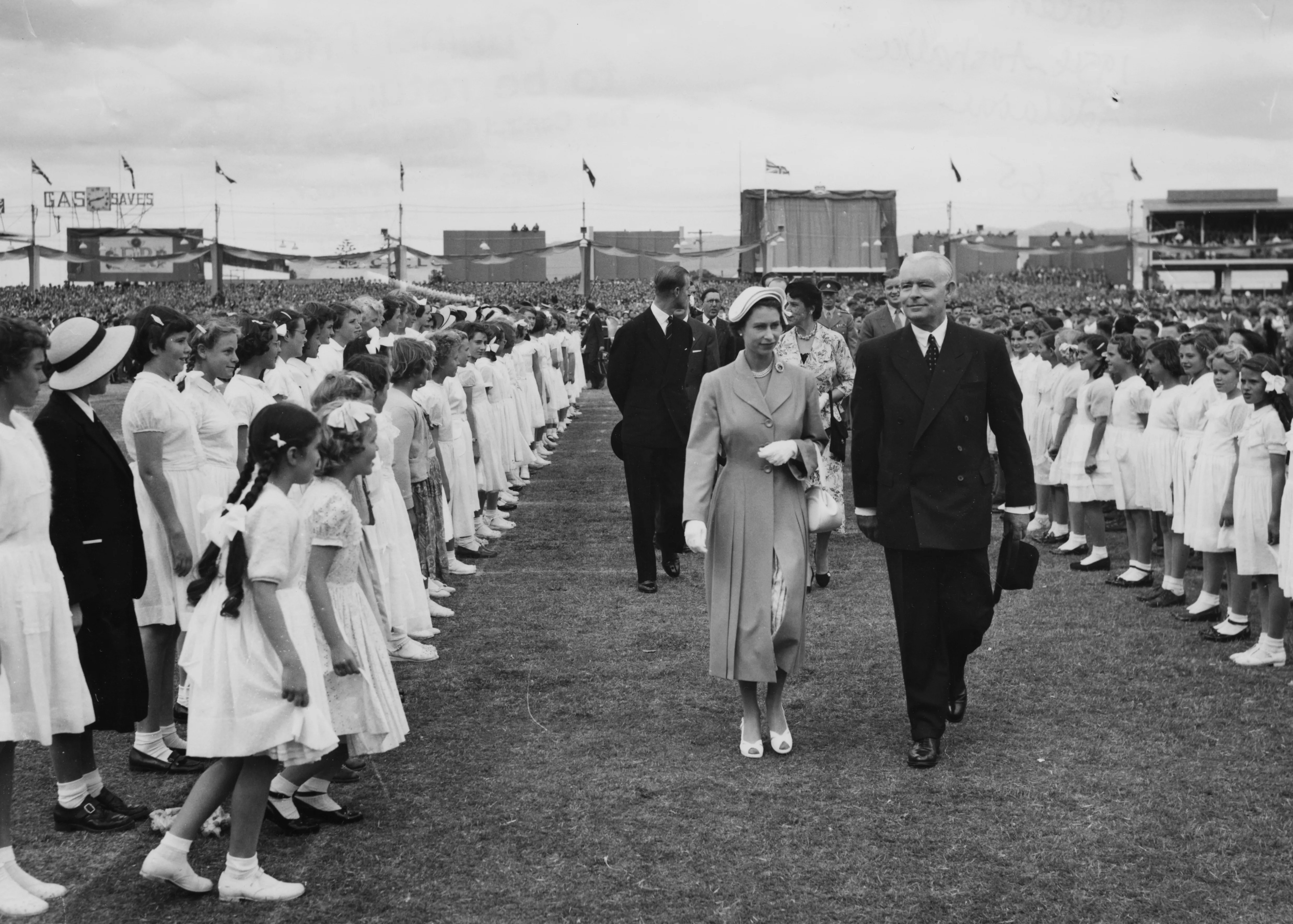 Princess Elizabeth talking to Prince Philip in 1954.
