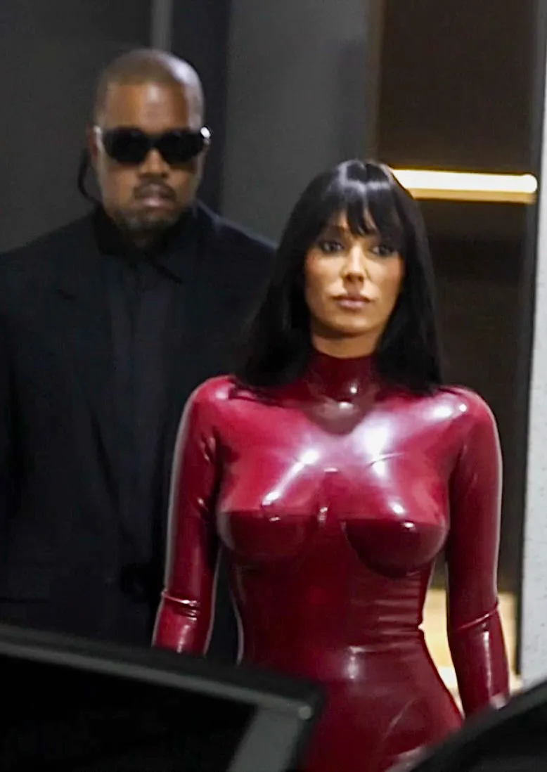 Bianca Censori in a red bodysuit with Kanye West in South Korea.