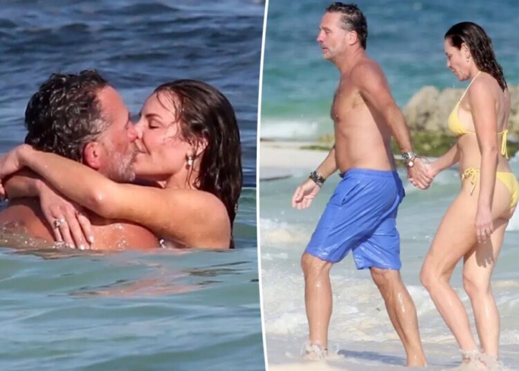 Bikini-clad Luann de Lesseps packs on the PDA with hunky boyfriend in Cancun