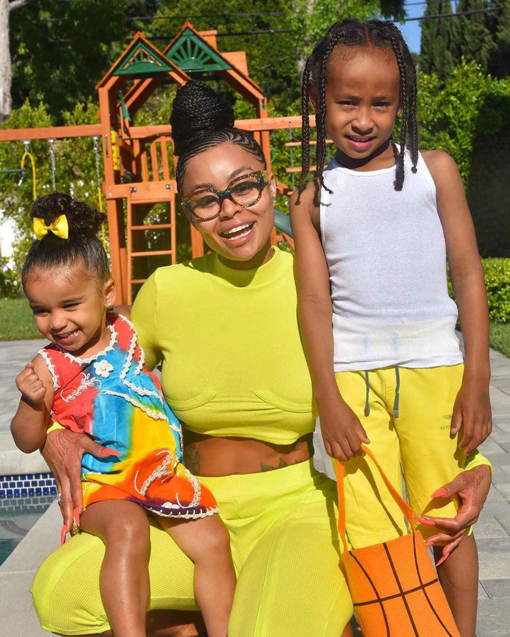 Blac Chyna posing with her son King and daughter Dream.