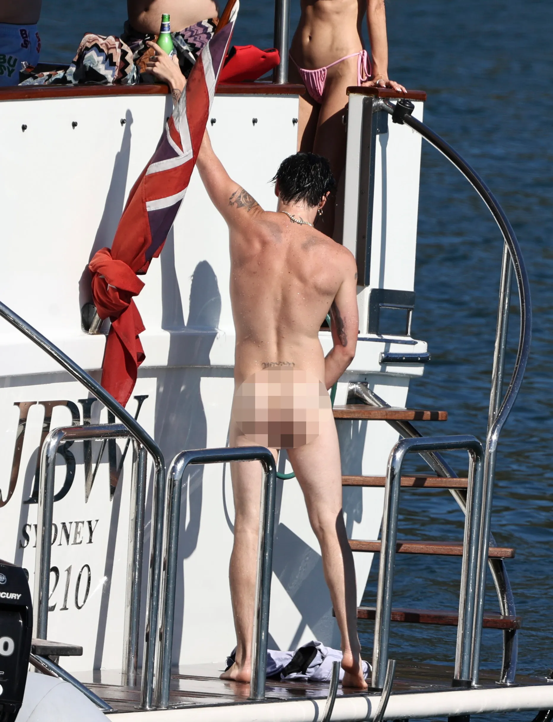 Yungblud on a yacht in Sydney.