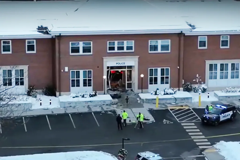 Police station with a damaged entrance from a car ramming.