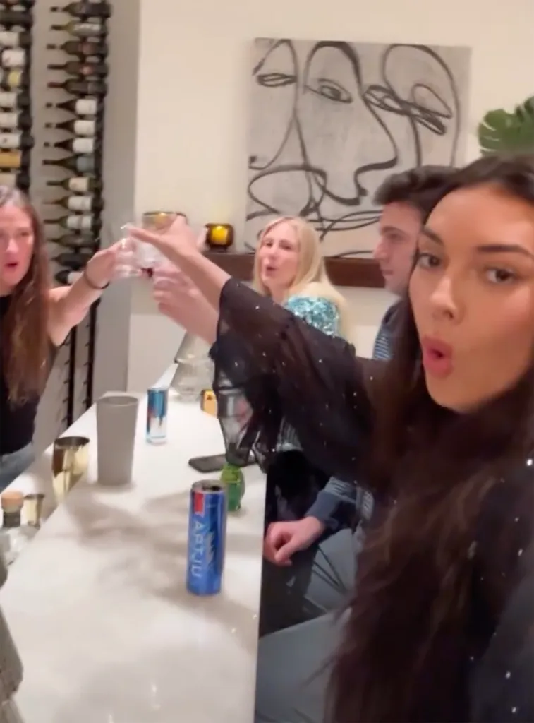 Brianna Chickenfry making a New Year's toast with friends