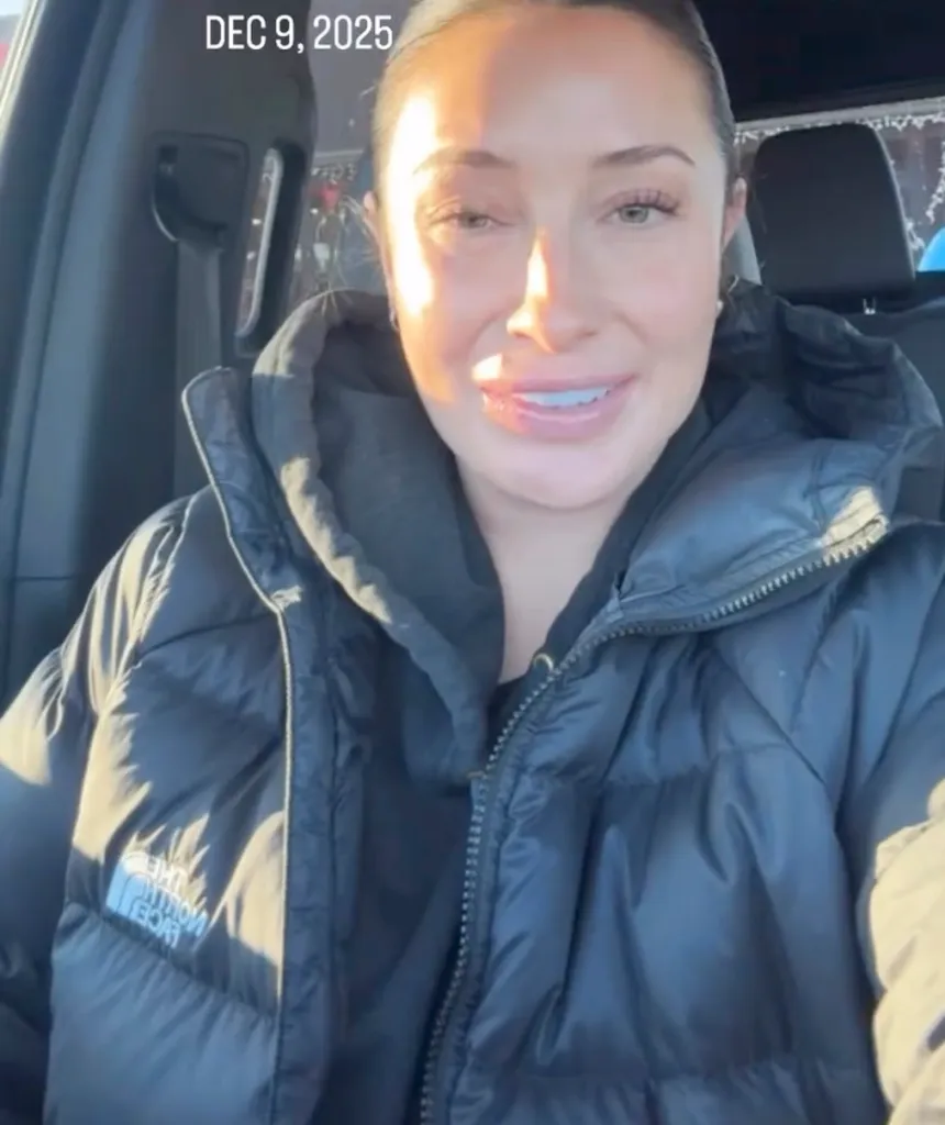 Bristol Palin in a black puffer jacket in a car.