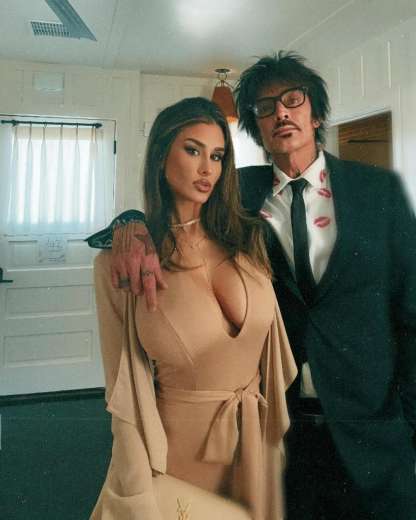 Brittany Furlan and Tommy Lee posing for a picture.