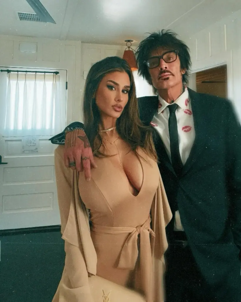 Brittany Furlan and Tommy Lee posing together.