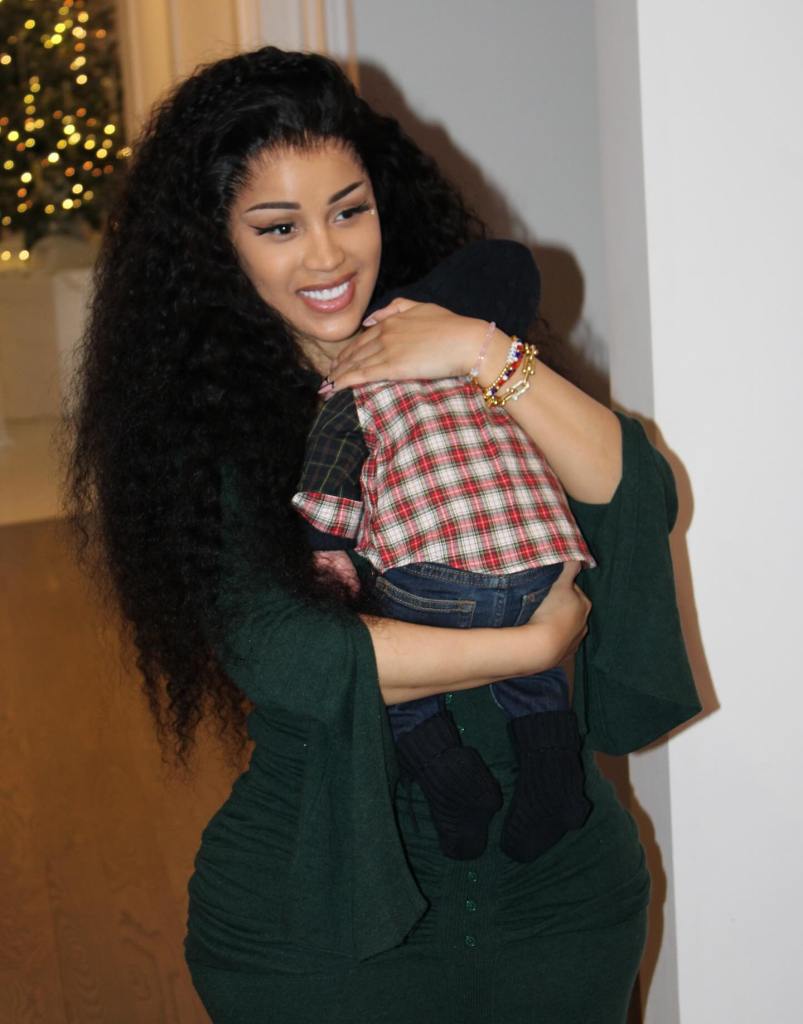 Cardi B holding her baby.