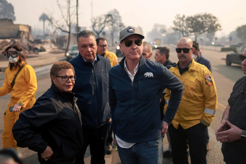 California Governor Gavin Newsom and Los Angeles Mayor Karen Bass tour the downtown business district of Pacific Palisades during a fire.