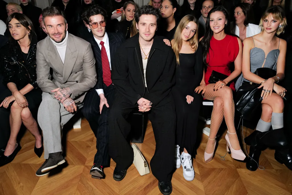 Carine Roitfeld, David Beckham, Cruz Beckham Brooklyn Peltz Beckham, Harper Beckham, Nicola Peltz Beckham and Mia Regan attend the Victoria Beckham AW24 show during Paris Fashion Week on March 01, 2024 in Paris, France.