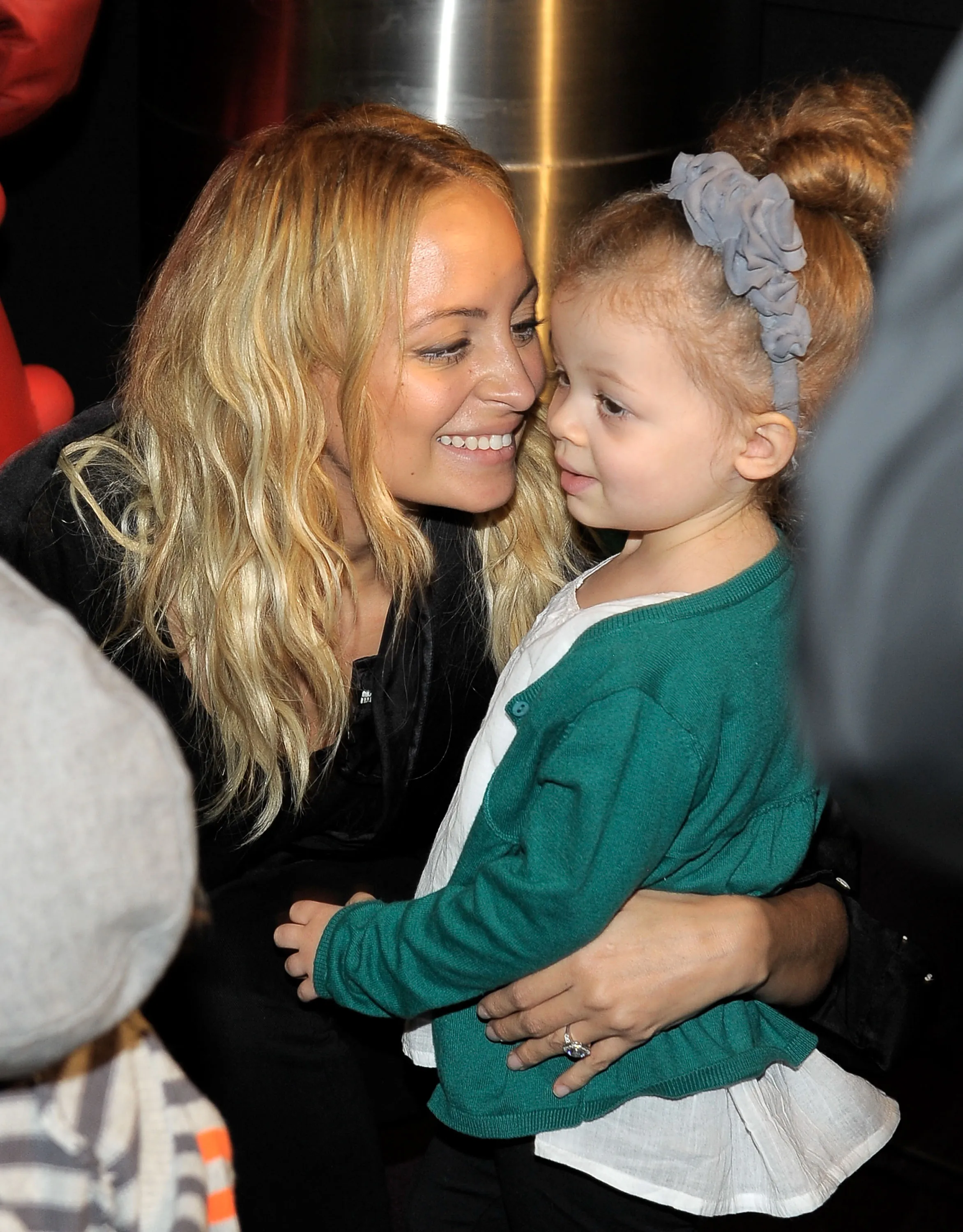 Nicole Richie smiling at her daughter, Harlow Madden, at Yo Gabba Gabba! Live!