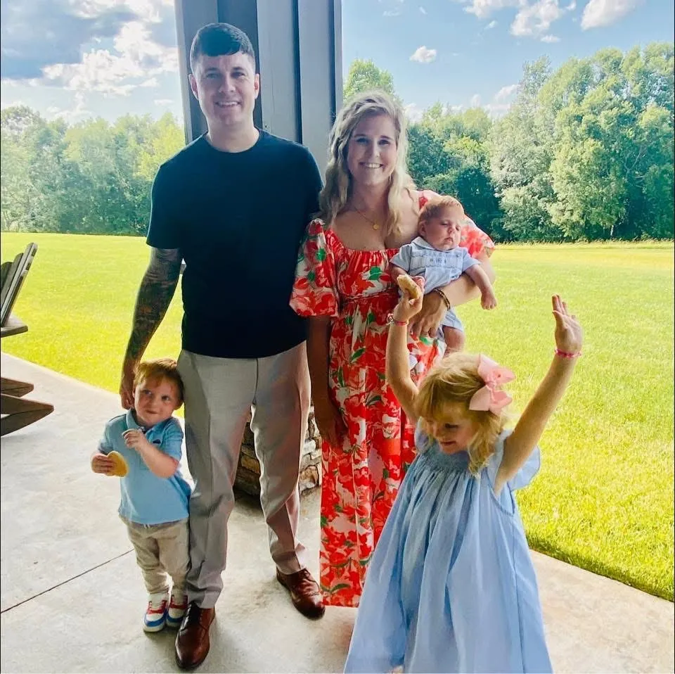 Matthew Traywick and his family with their three young children.