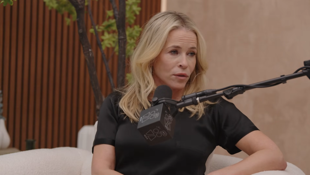 Chelsea Handler speaking into a microphone.