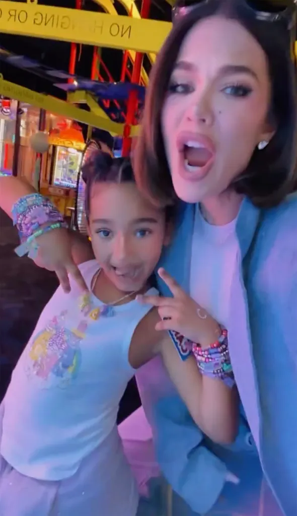 Chicago West and Khloe Kardashian posing for a photo.