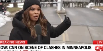 ‘Guns drawn!’ Tear gas engulfs angry crowd in tense ICE protest