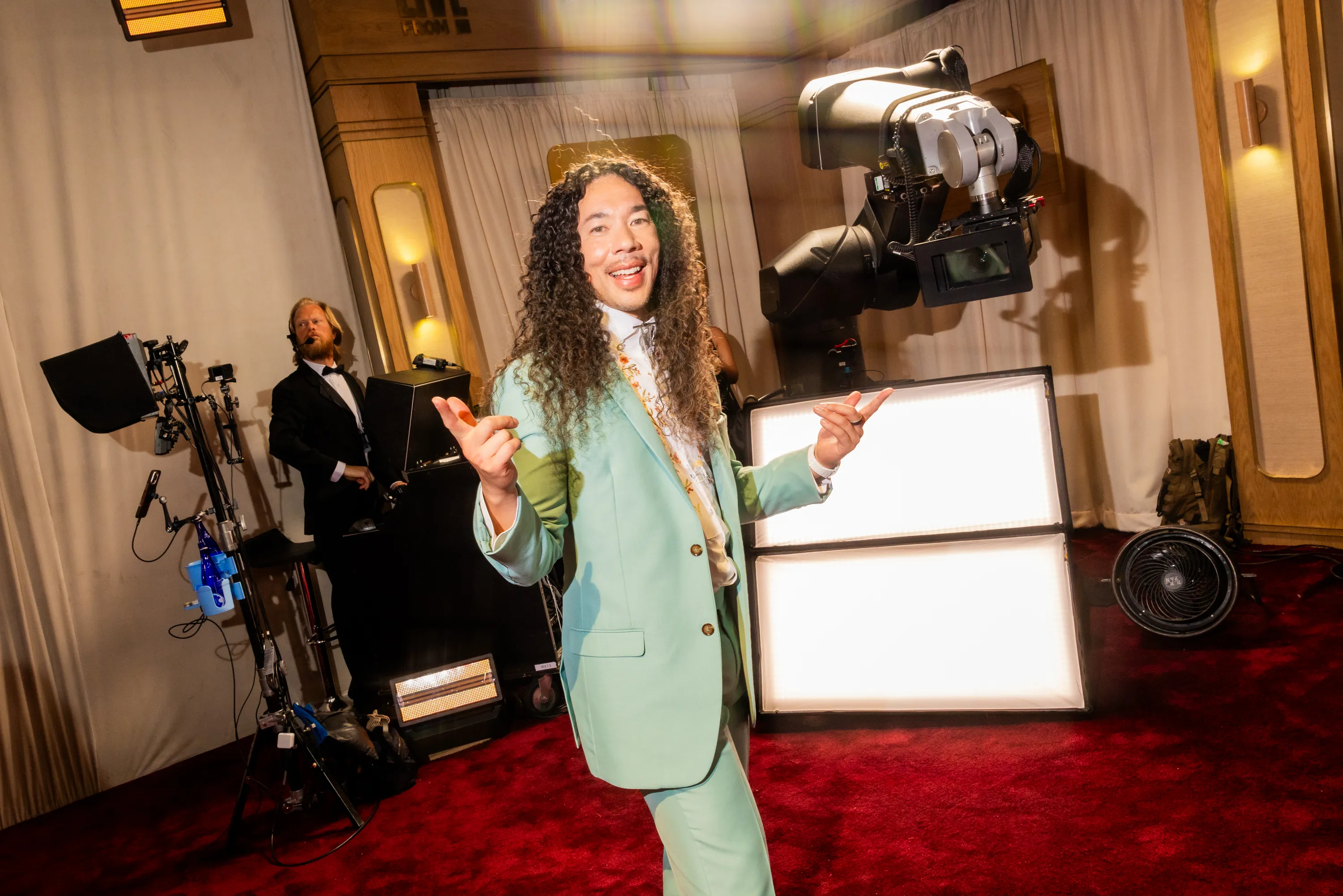 Cole Walliser posing for a photo on the red carpet.