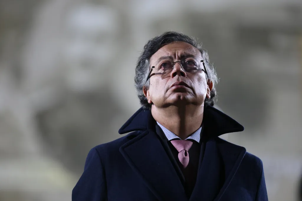 Colombian President Gustavo Petro looking up during a swearing-in ceremony.