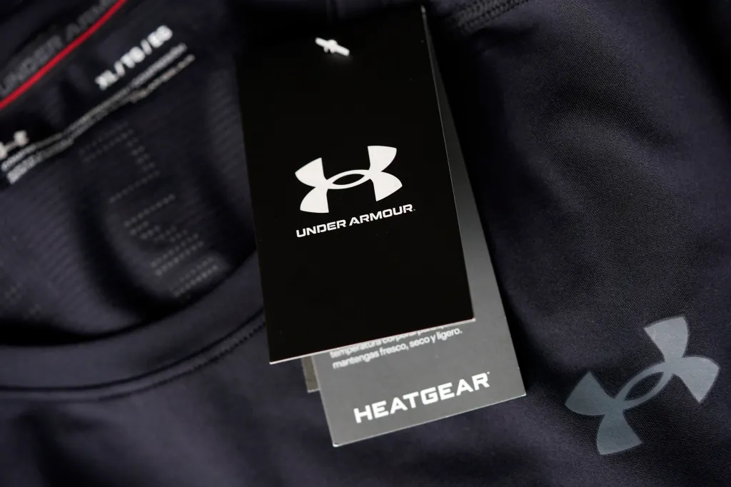 A close-up of a black Under Armour tag with 
