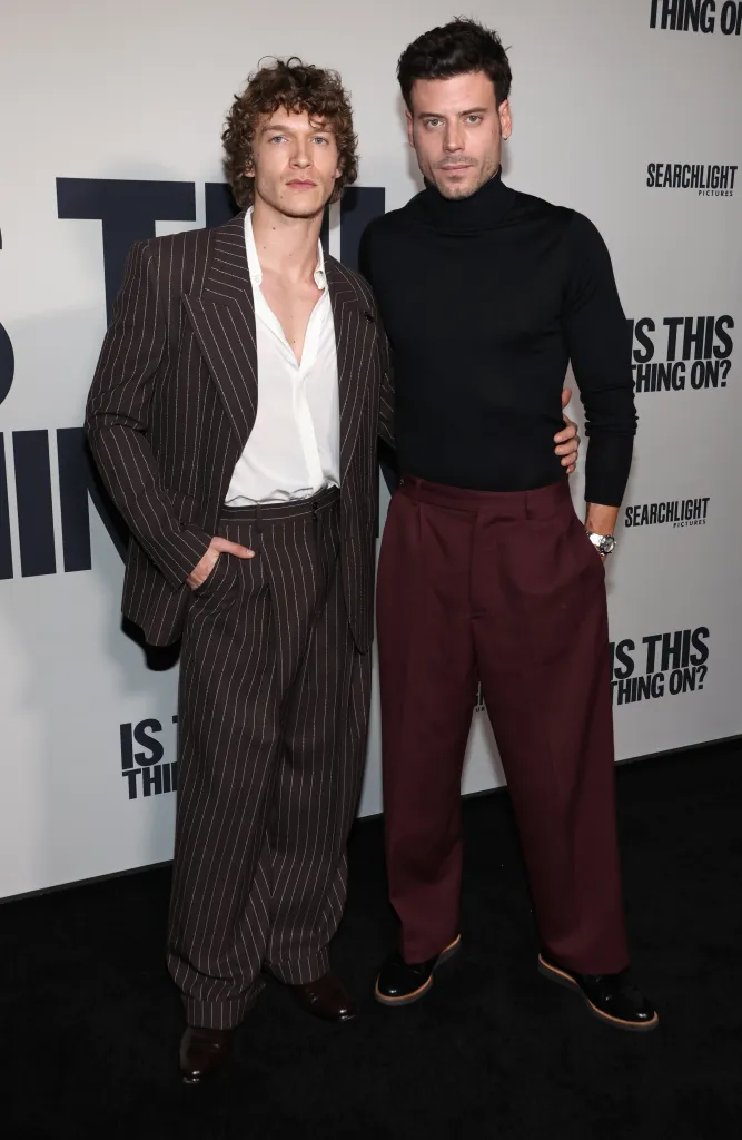 Connor Storrie and Francois Arnaud posing for a photo at the 'Is This Thing On' film premiere.