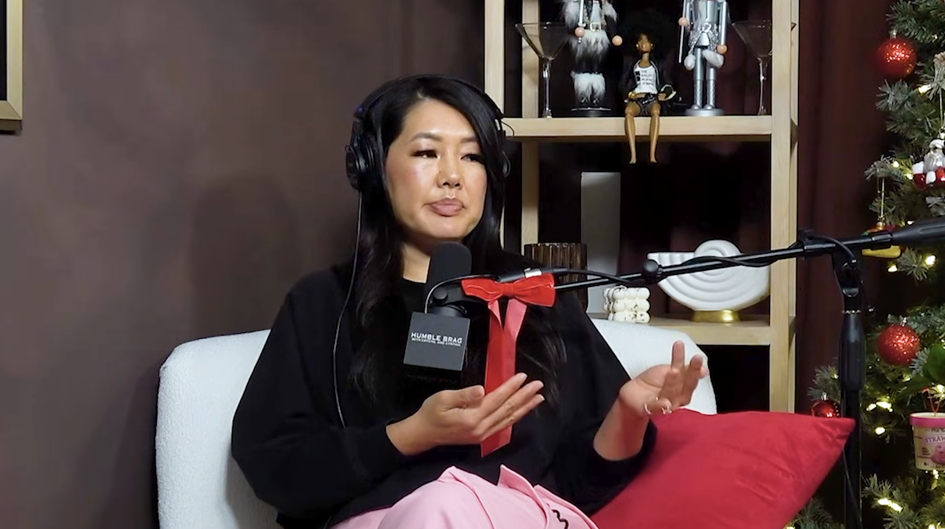 Crystal Kung Minkoff speaking into a microphone.