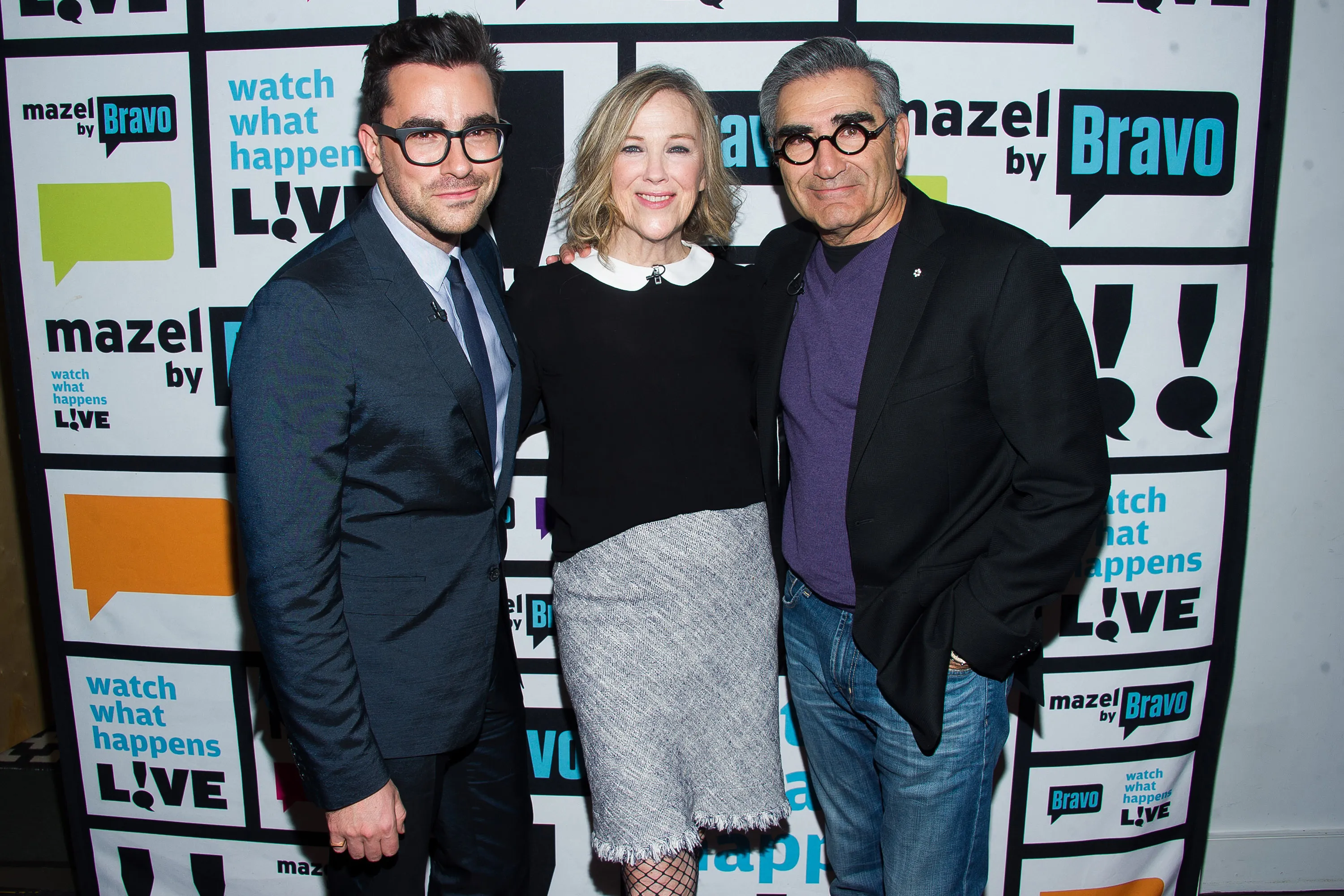 Daniel Levy, Catherine O'Hara, and Eugene Levy posing for a photo.