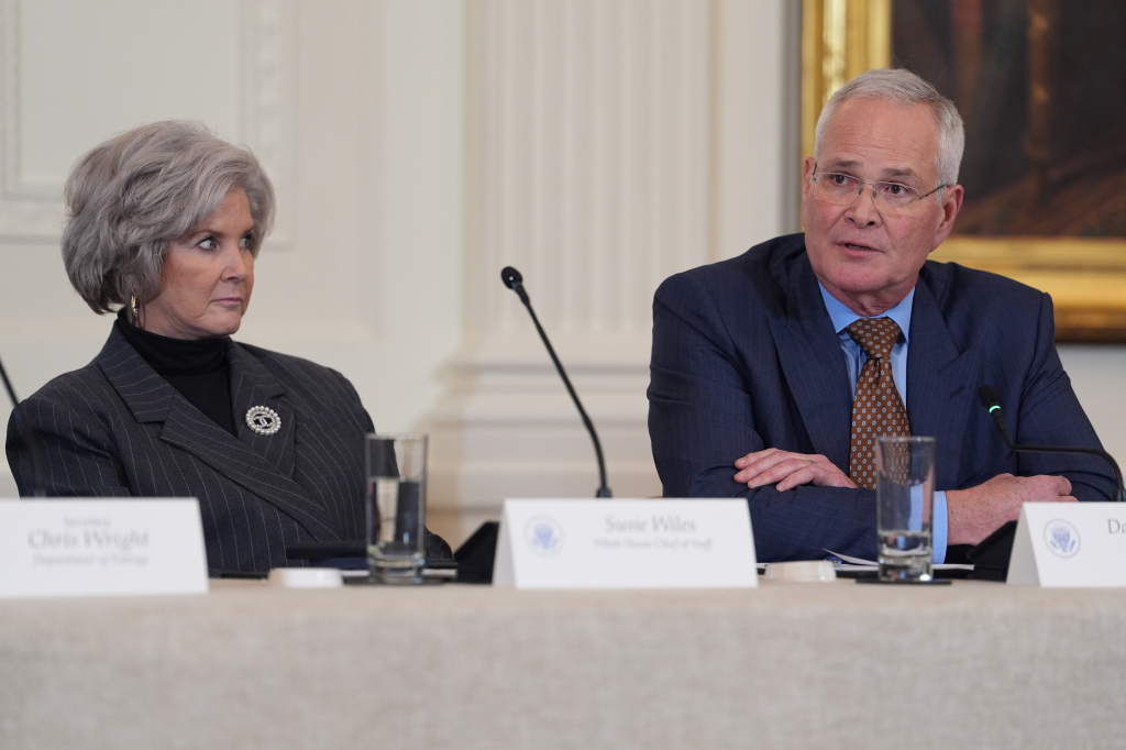 Darren Woods speaking while Susie Wiles listens during a White House meeting with oil executives.