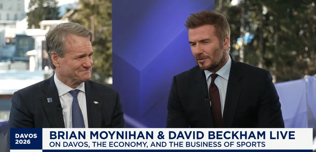 Brian Moynihan and David Beckham on stage together at Davos 2026.