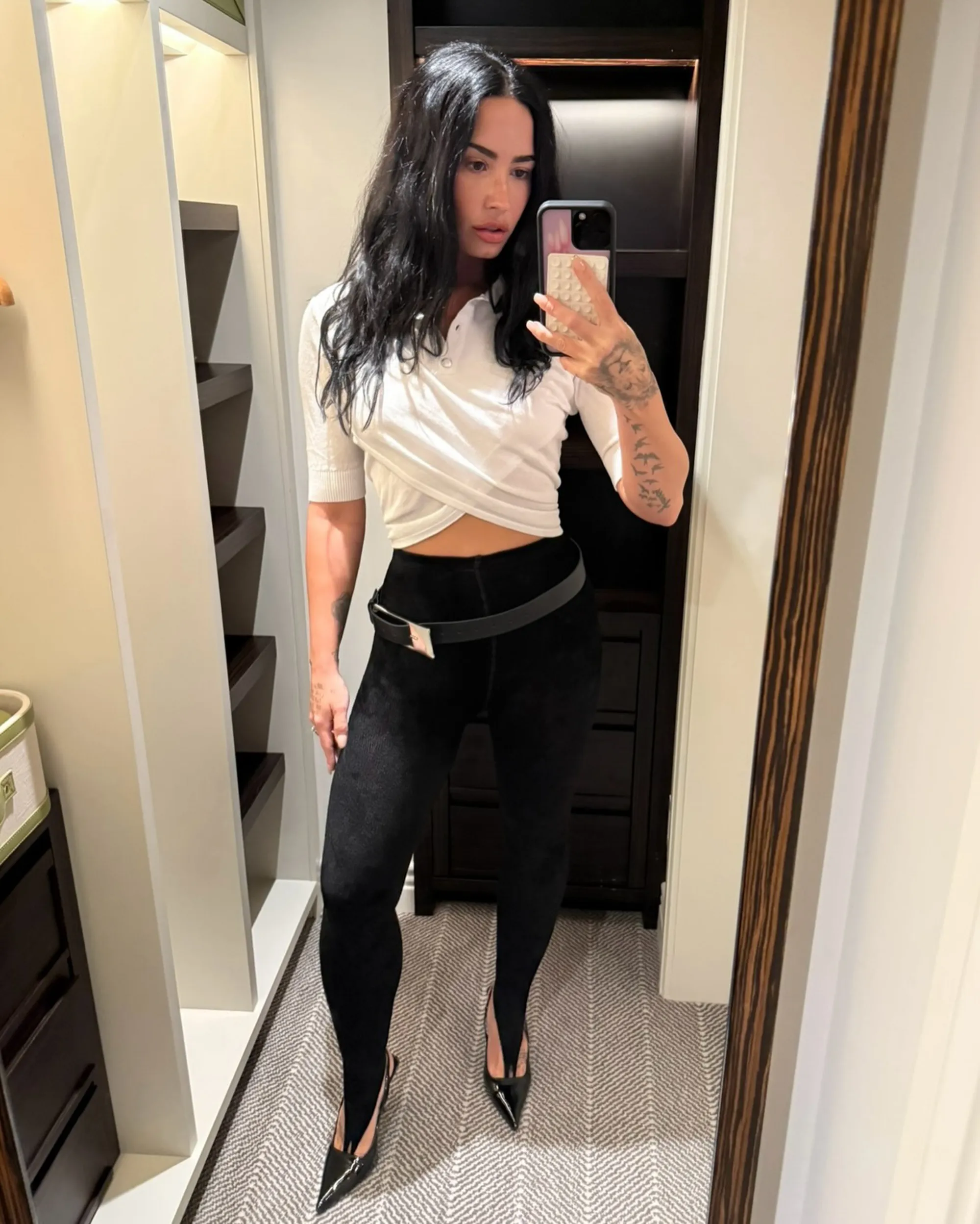 Demi Lovato shows off her thin figure in a mirror selfie
