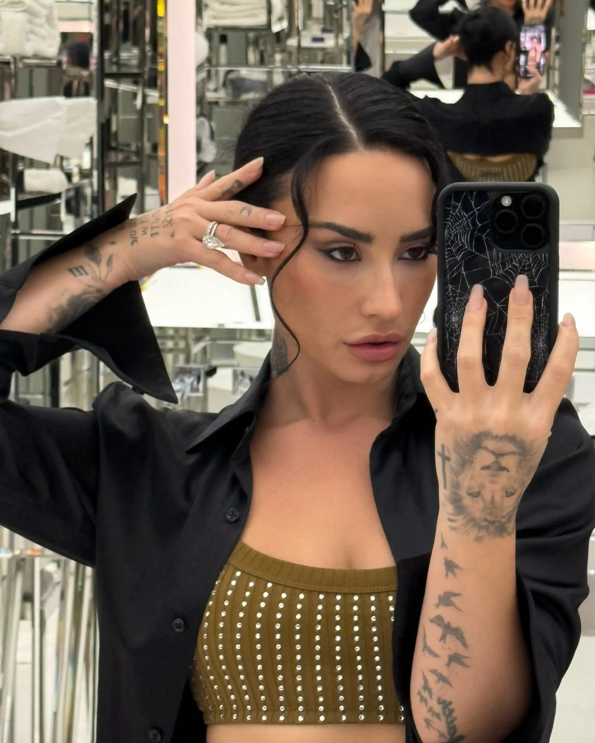 Demi Lovato posing in a photo from her 2025 Instagram dump