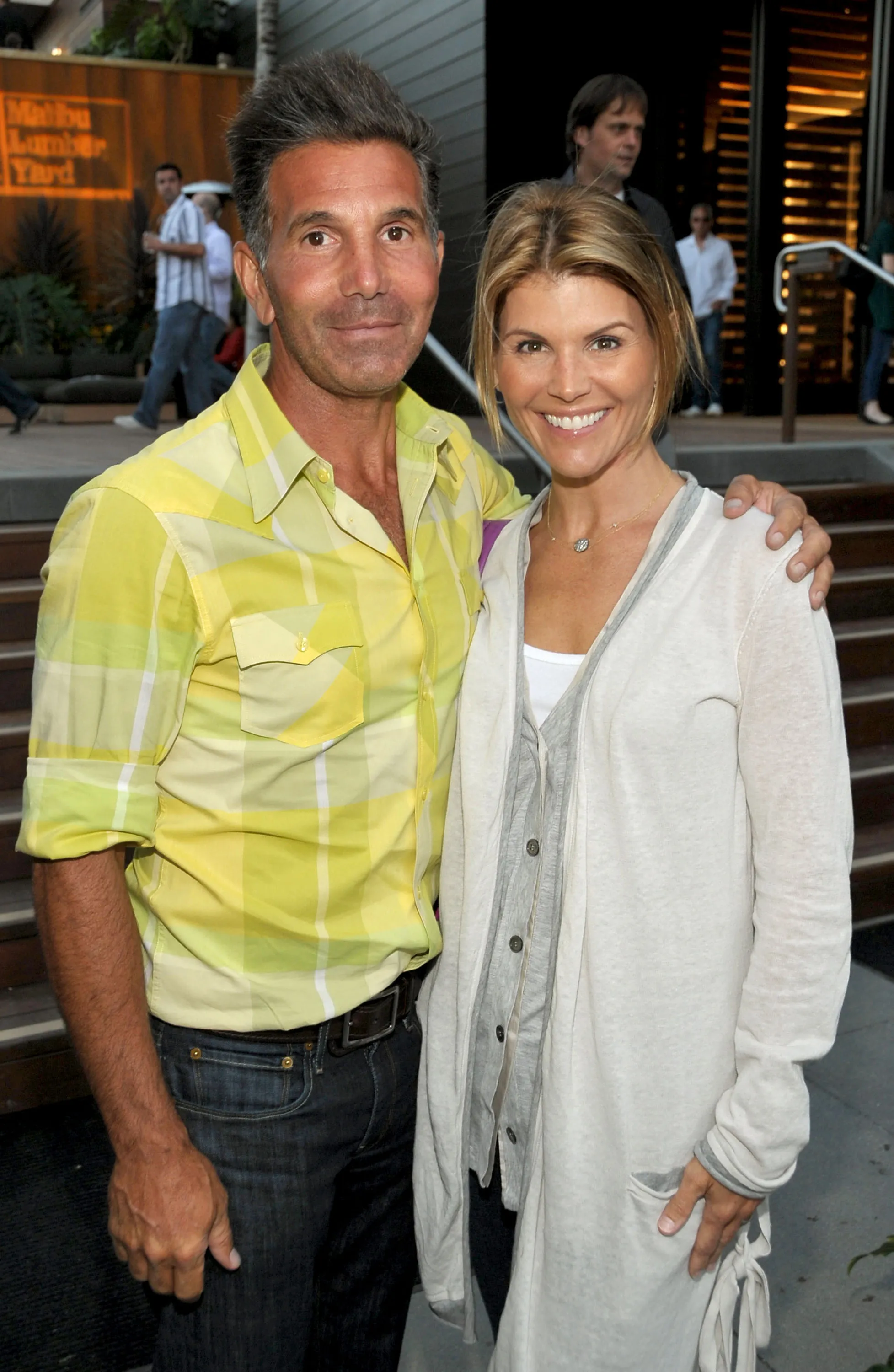 Mossimo Giannulli and Lori Loughlin at the Malibu Lumber Yard grand opening.