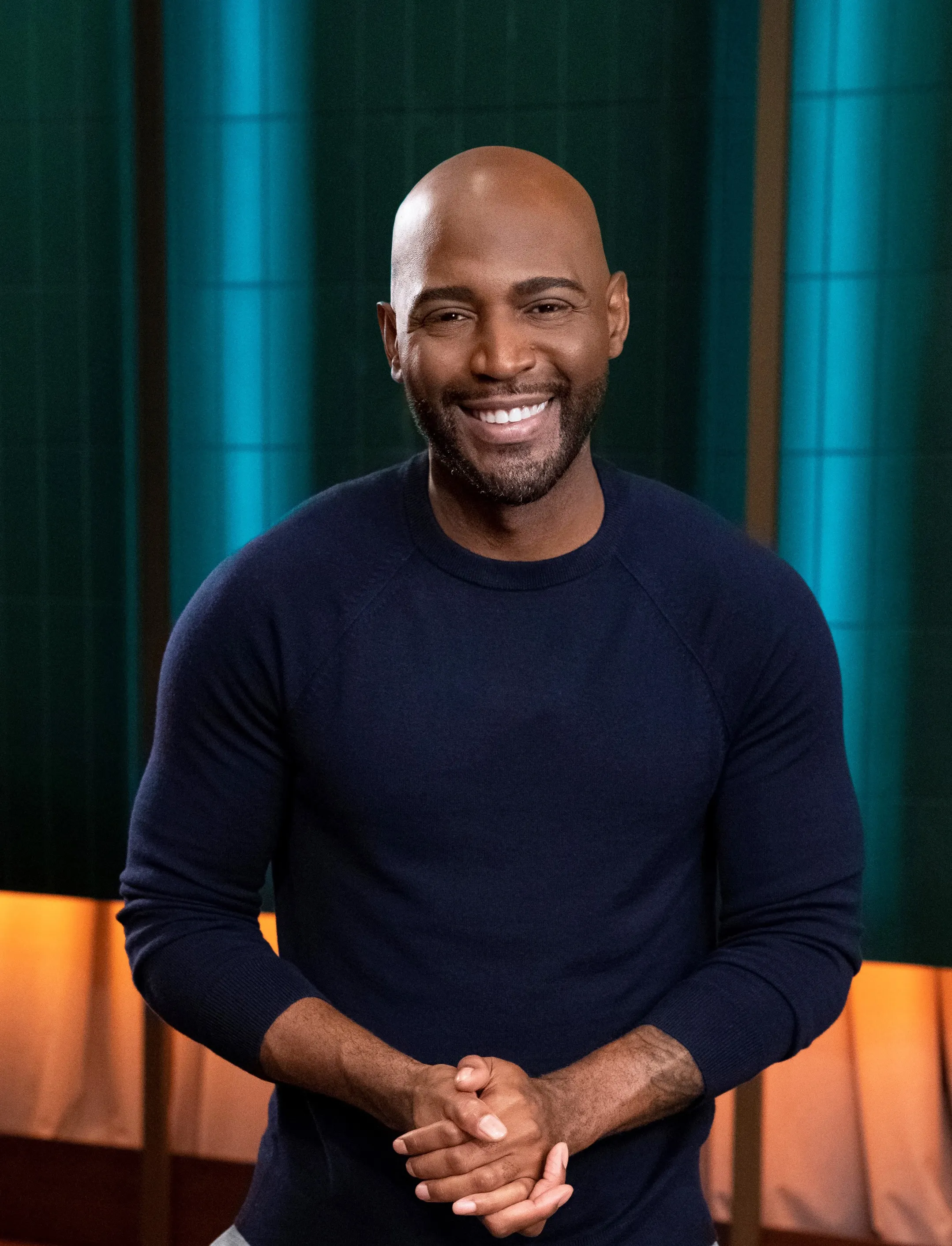 Headshot of Karamo Brown smiling.